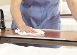 cleaning surfaces with recycled microfibre wipe